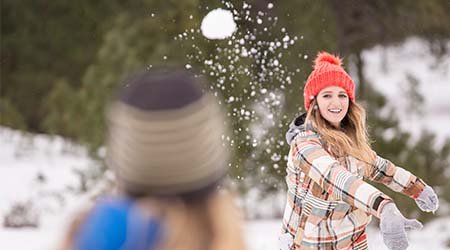 U of I students playing in the snow.