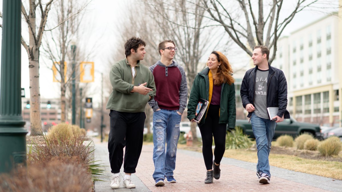 Four students walking in Boise, Idaho.