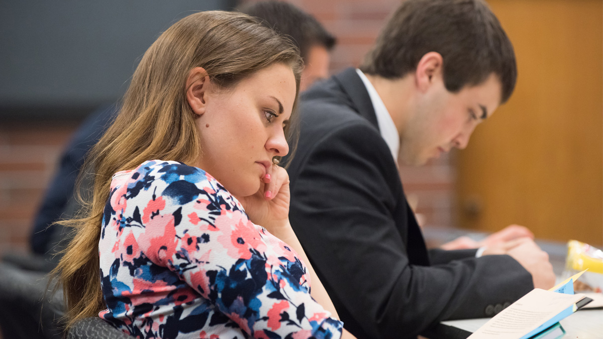 Law students reading at their desks