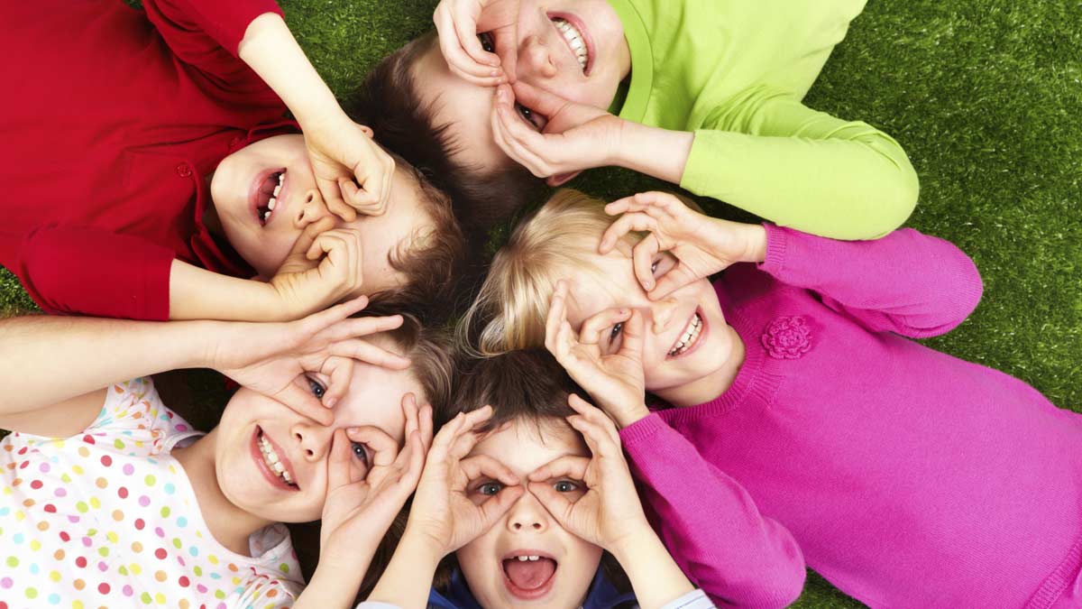 Children laying in a circle