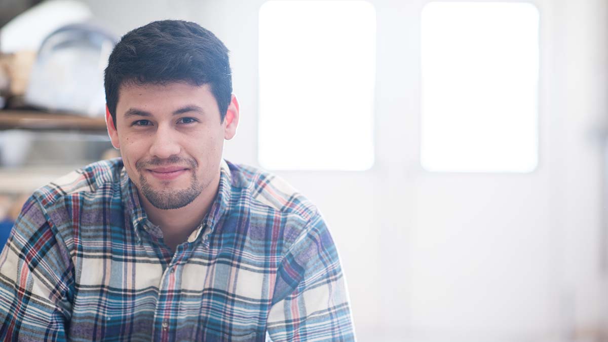 A veteran student in an art studio