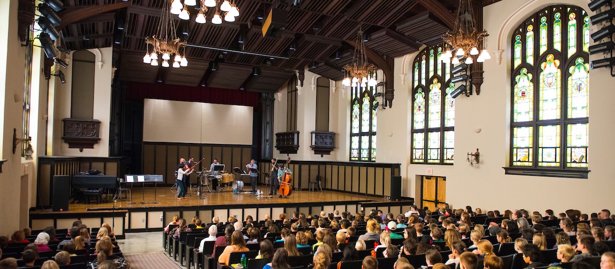 Performers on stage at the Administration Auditorium.