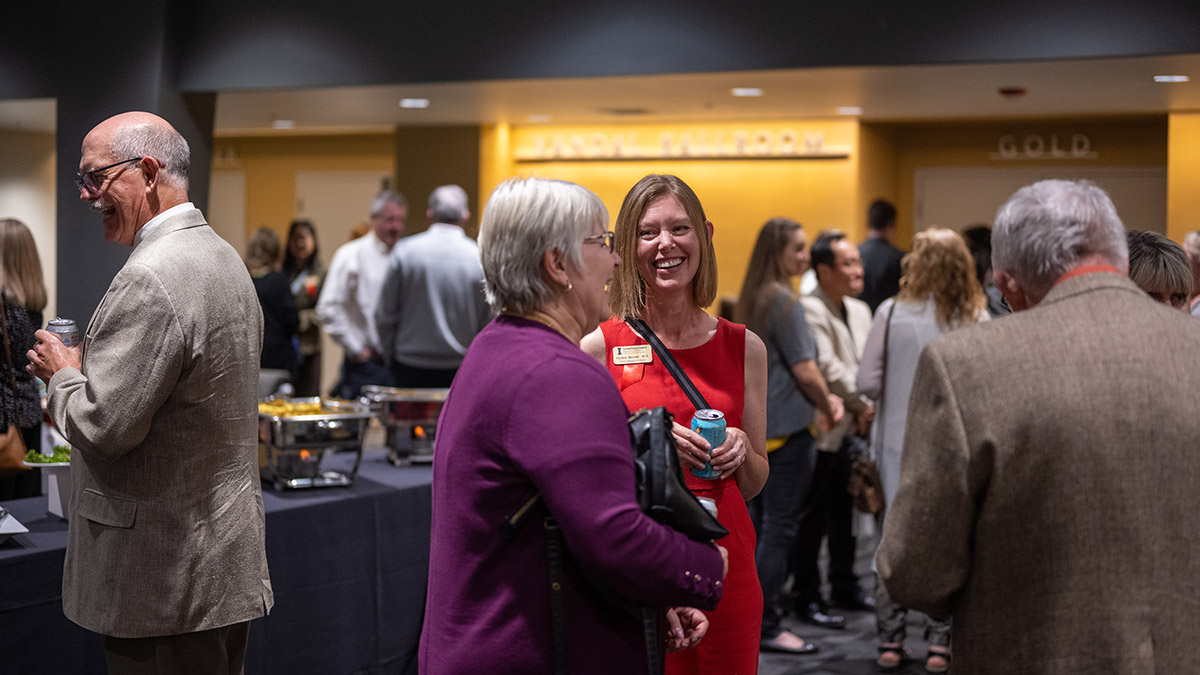 Faculty members talking